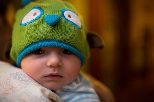 His cute owl hat Great Aunt Holly got him.