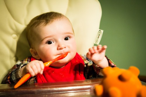 Trying to feed himself