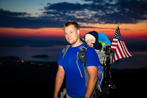 Top of Cadillac Mountain on the 4th of July. Notice the sleeping baby, he slept through it all. 