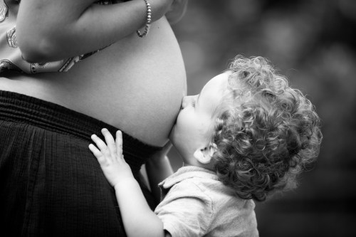 Cam kissing the baby